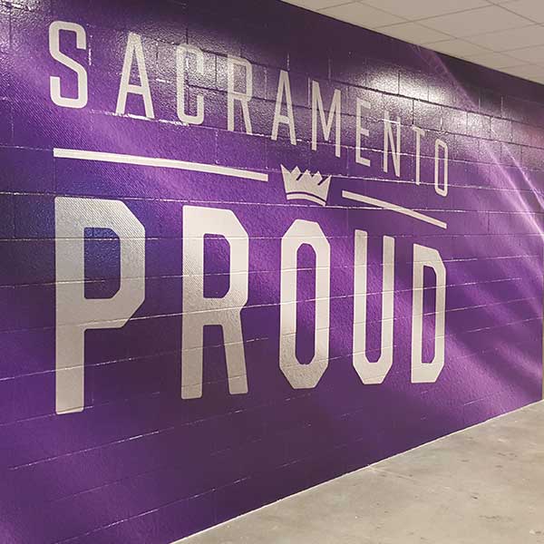 Brick wall vinyl graphic installed inside the arena